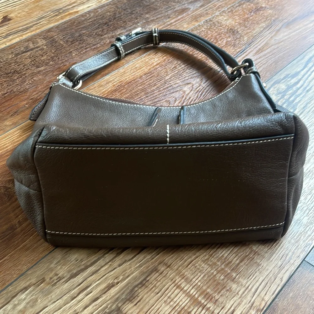 Dooney and Bourke. Brown leather shoulder bag. Has interior stains. - Picture 5 of 14